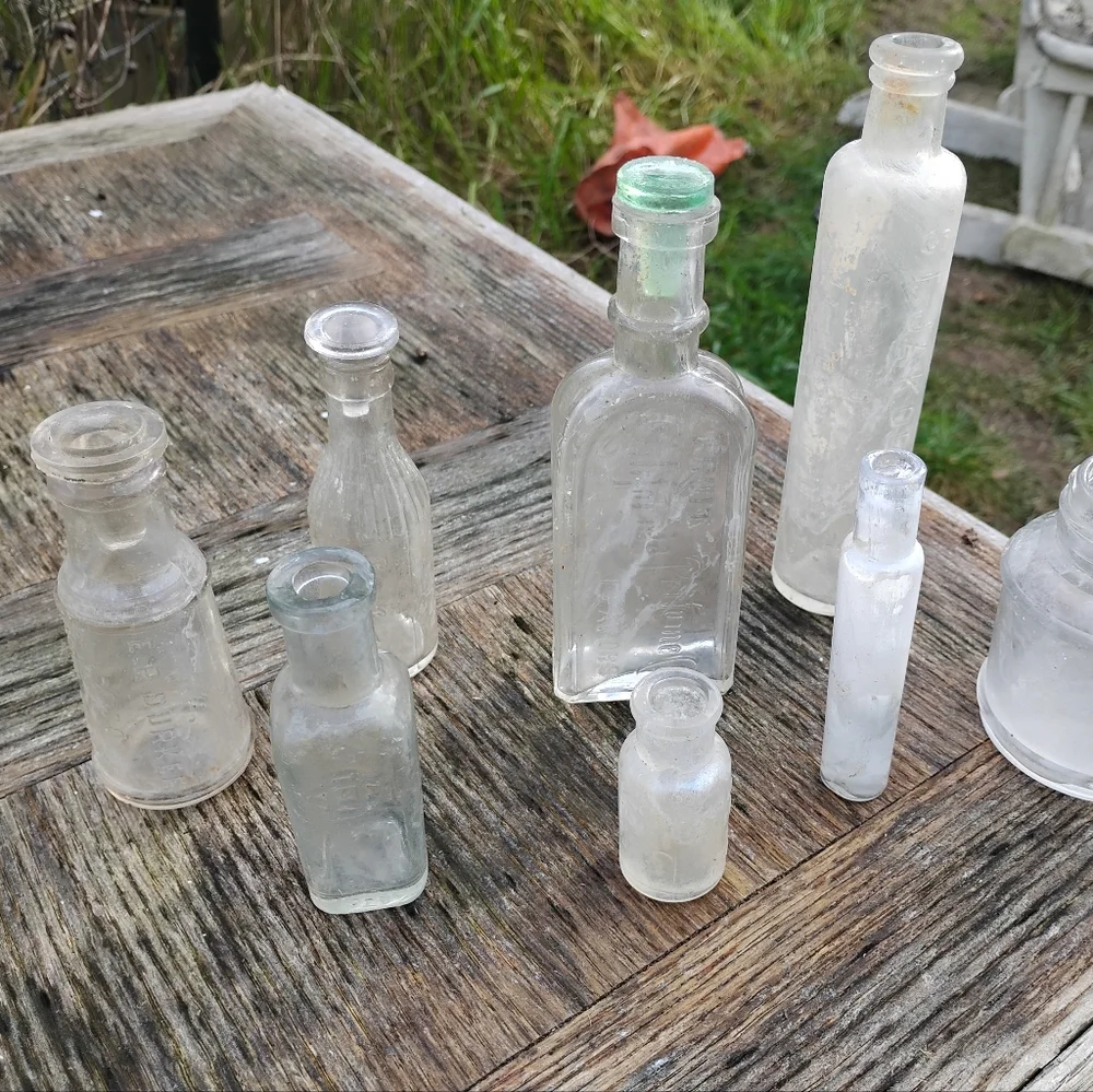 Collection of 8 vintage antique bottles